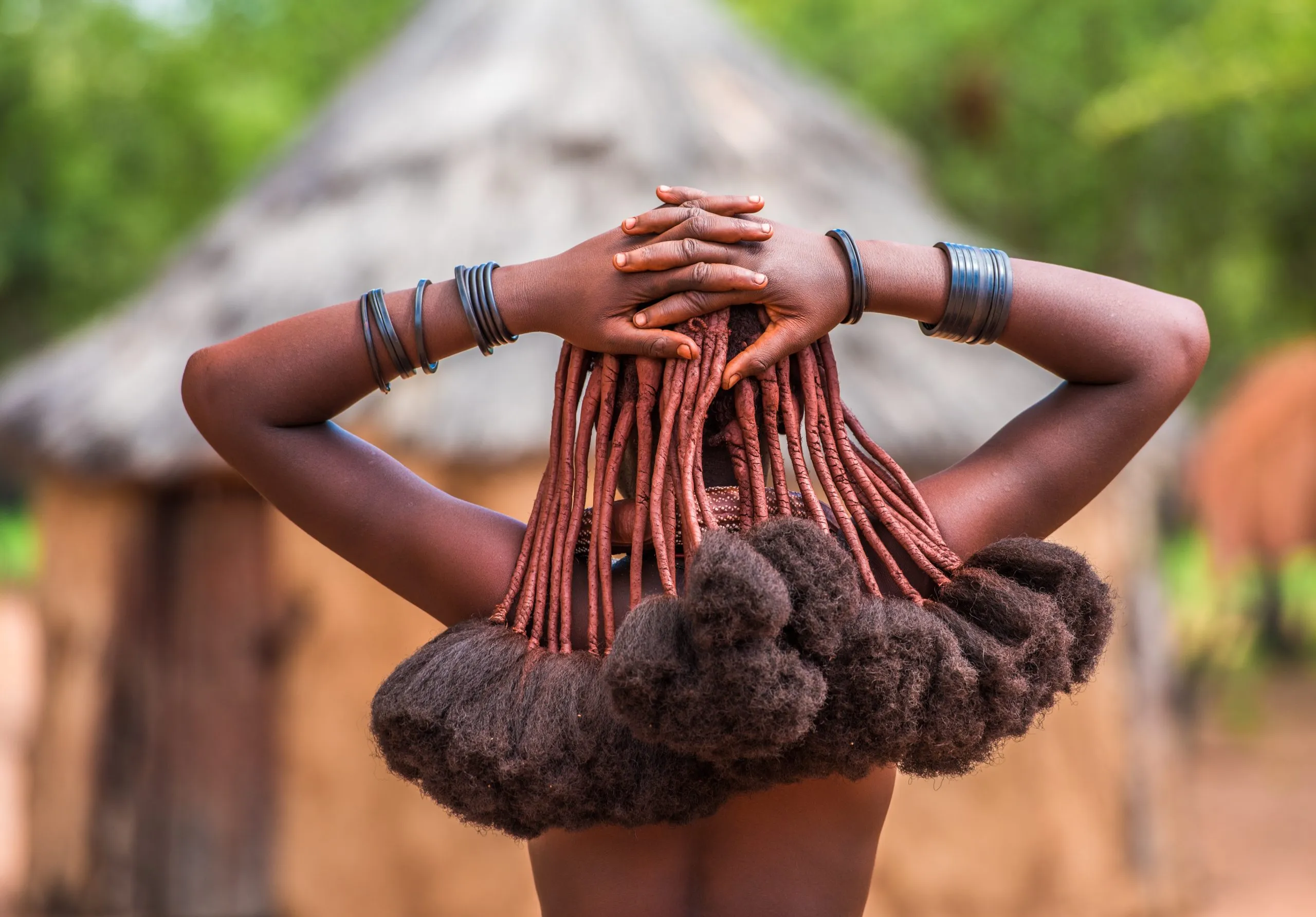 Hair style of Himba women, tribespeople living in northern Namibia